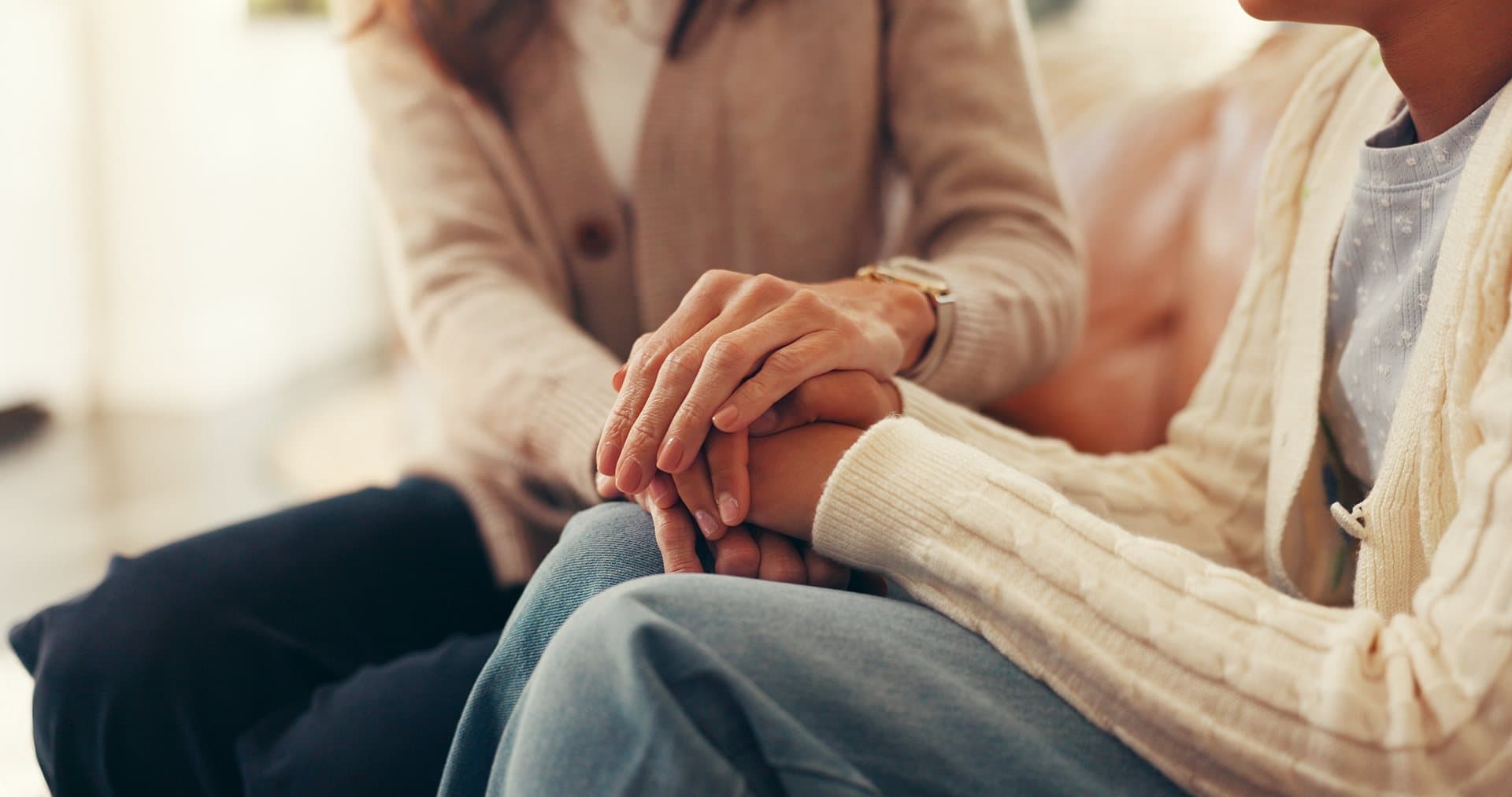 Two people offering each other support